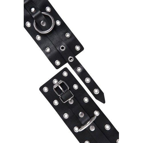 Черные кожаные однослойные наручники с люверсами