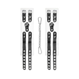 Бело-черные оковы с двумя ремешками и люверсами