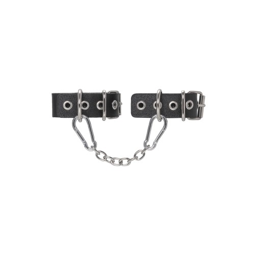 Черные кожаные наручники-браслеты из одного ремешка с люверсами