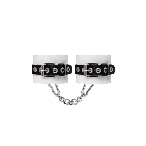 Бело-черные кожаные наручники с одним ремешком с люверсами