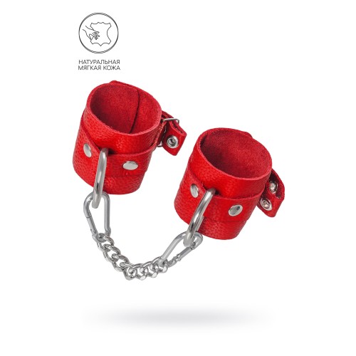 Красные мягкие кожаные наручники с люверсами