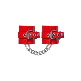 Красные мягкие кожаные наручники с люверсами