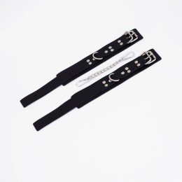 Черные кожаные оковы с регулируемыми ремешками