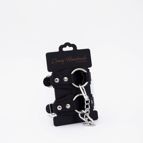 Черные кожаные наручники с кольцом