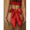 Красные трусики с большим атласным бантом сзади