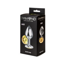 Большая серебристая анальная пробка Diamond Yellow Sparkle Large с жёлтым кристаллом - 8 см.