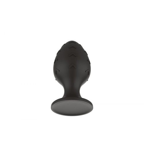 Черная средняя силиконовая анальная пробка с рельефом в виде галочек